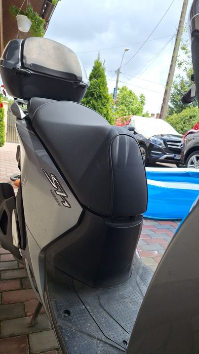 Vand sau schimb cu ATV..Honda sh 125i an fabricație 2016 km 7000