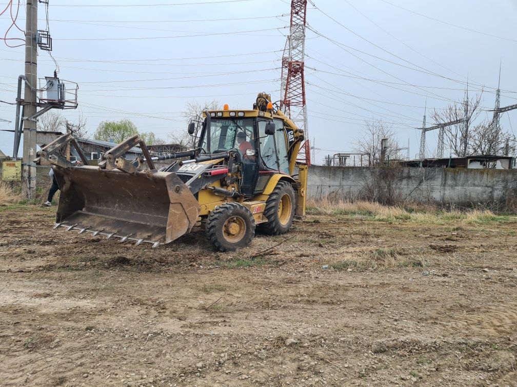 Inchiriez Buldoexcavator Caterpillar  1200/zi