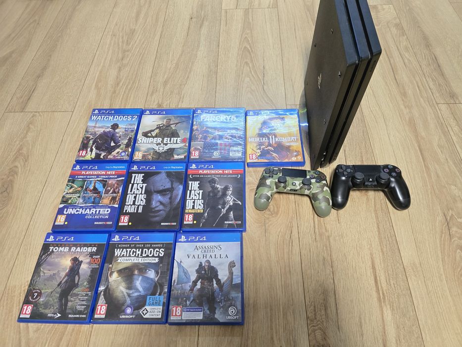Playstation 4 PRO + 2 controlere + 10 jocuri
