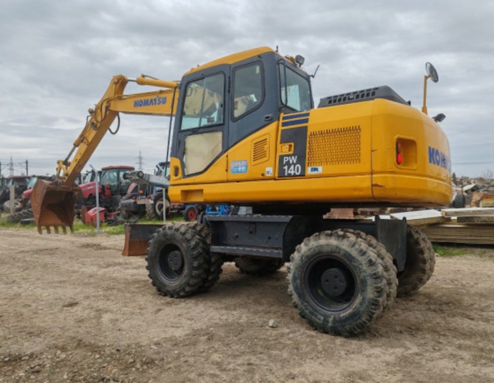Excavator pe Roti Komatsu PW140-7