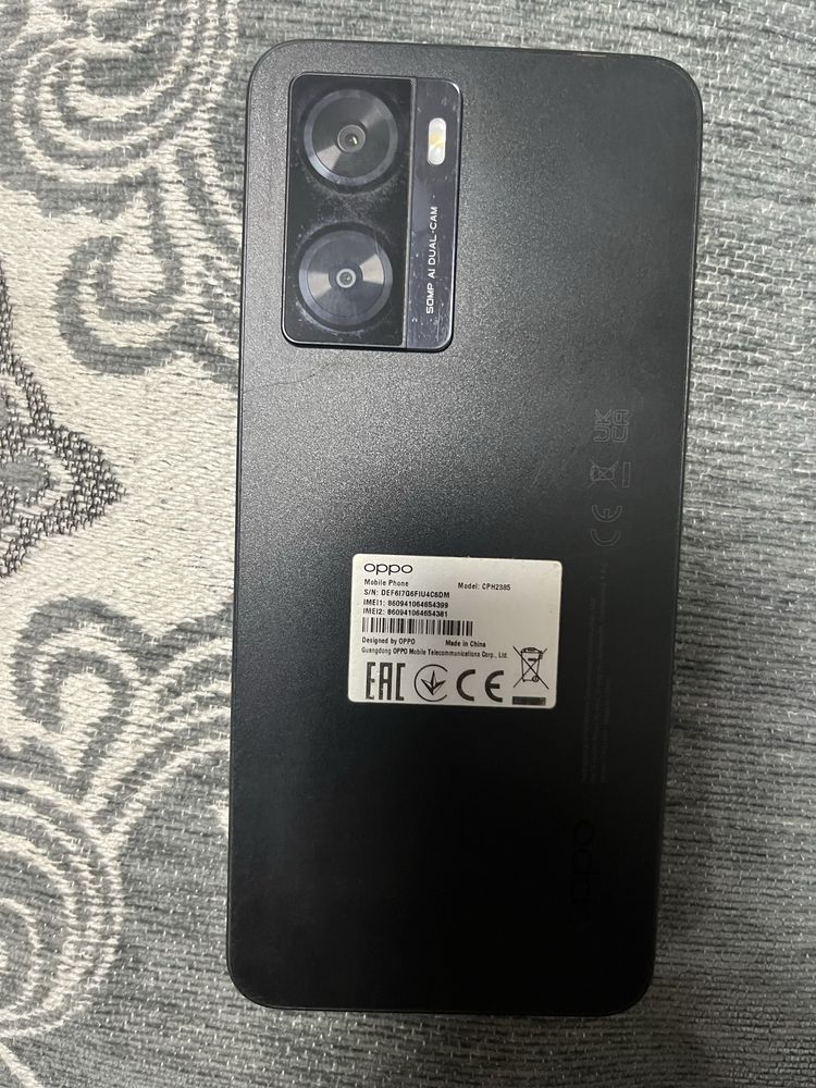 OPPO A57s - смартфон.
