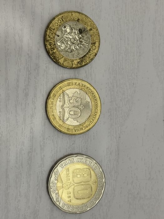 Редкие монеты теңге 100 200
