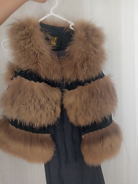 Продам меховую жилетку