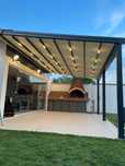 Pergola Terasă retractabilă:  Stil și Confort pentru Spațiul Extern.