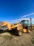 Buldoexcavator CASE 590 Super R de vânzare