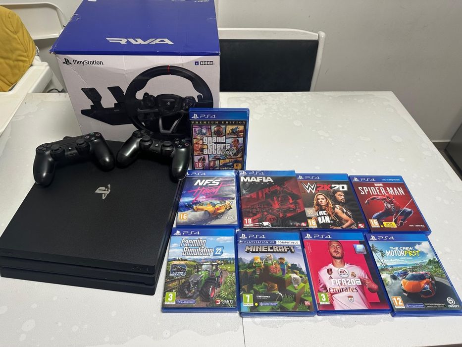 Vand Ps4 1TB cu9 jocuri volan si pedale