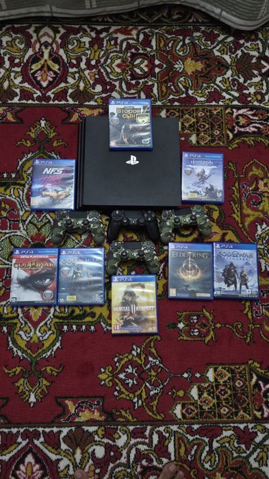 PS4 PRO 1TB + 4 джойстика и 8 игр в комплекте
