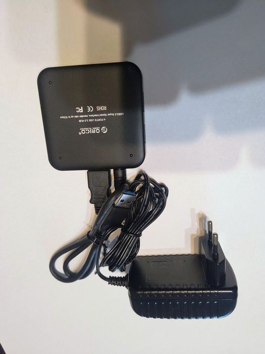 Hub ORICO smart cu 4 port USB 3.0 suport BC 1.2 charger.