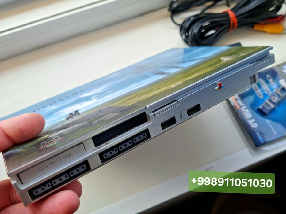 PlayStation 2 slim 2ta yangi joystik bilan.