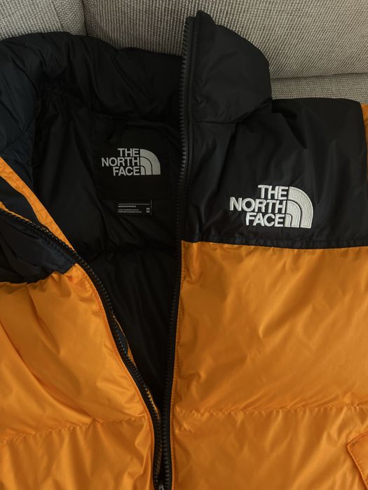 Geaca originala The North Face cu pene si puf