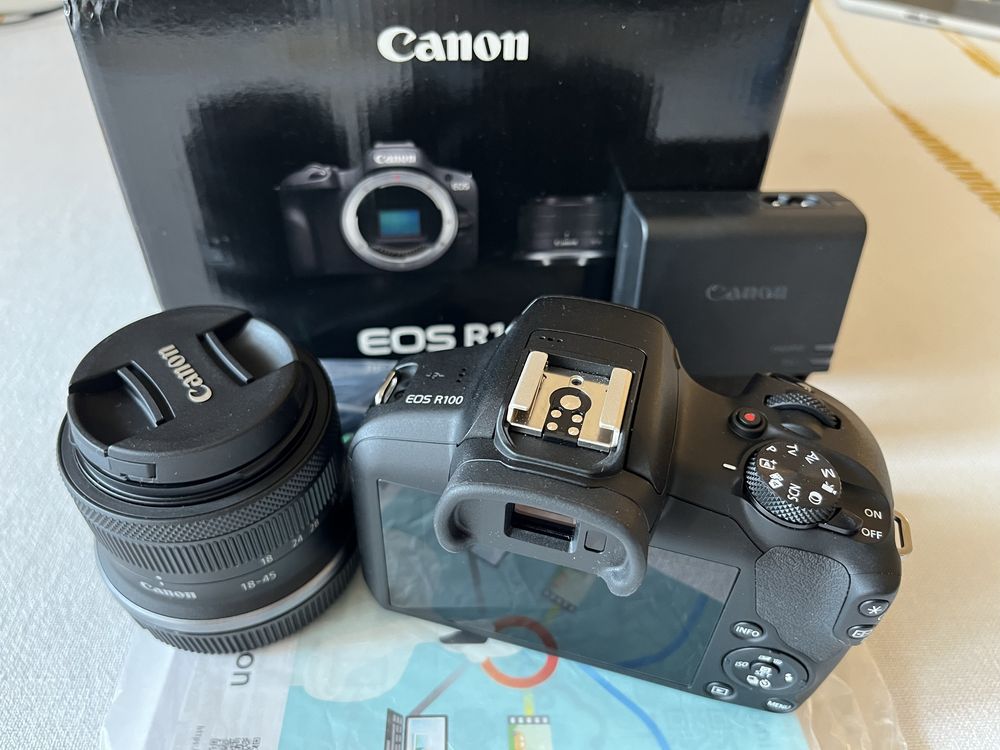 Canon R100 nou la cutie complet kit obiectiv RFS 18-45mm IS