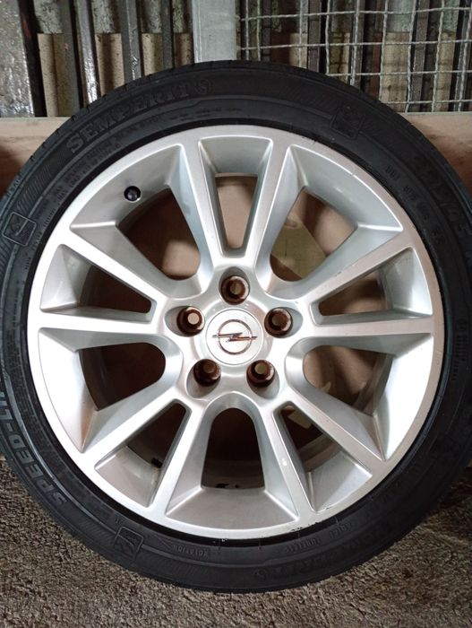 OPEL ASTRA H джанти със летни гуми 225/45/17 7J ET39 5x110 цо 66