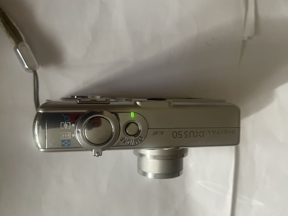 Canon Ixus 50 ,metal , made in Japan, afisaj data ora pe poze