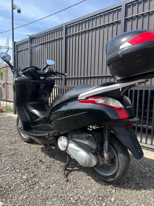 Honda S-wing 125 cc
RATE Fara Avans