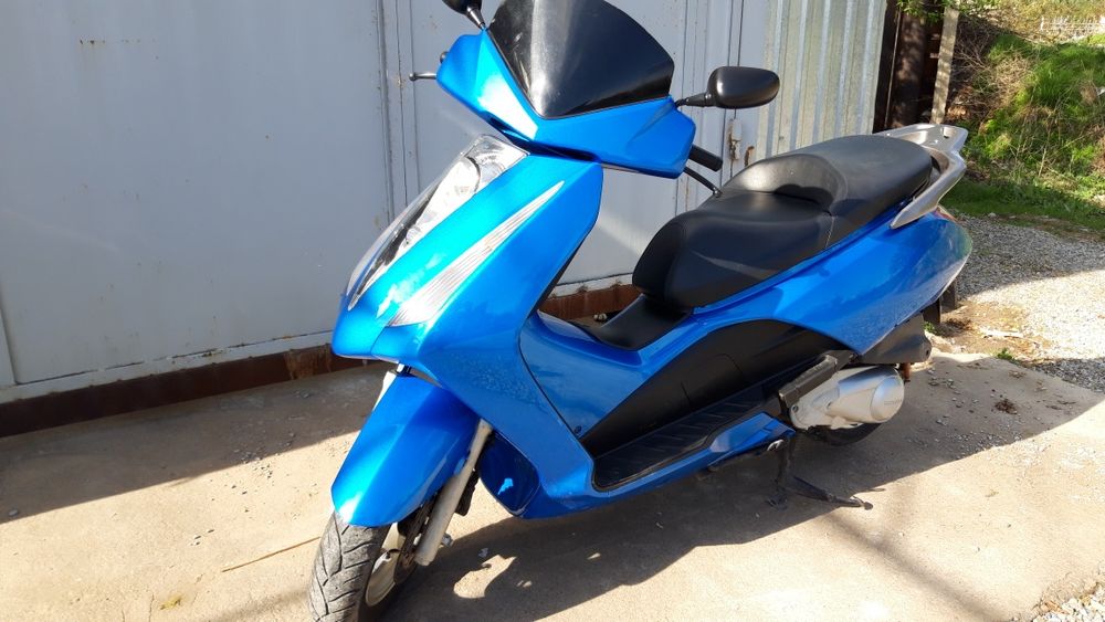 Скутер Honda pantheon