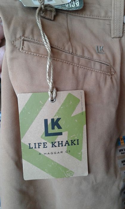 Продавам нов висококачествен мъжки панталон тип дънки - бежов