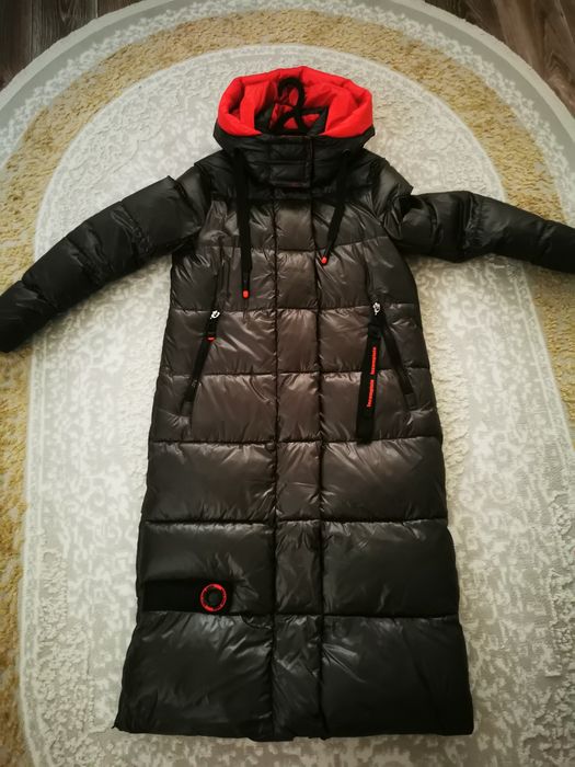 Продам пуховик зимний новый