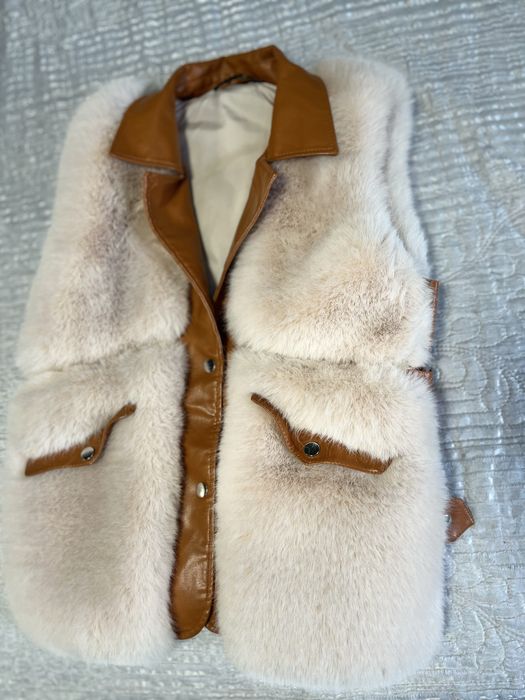 Дамски пухен елек