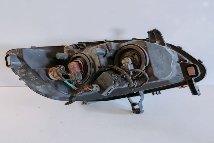 Far stanga cu cleme rupte 89100054 Opel Zafira A