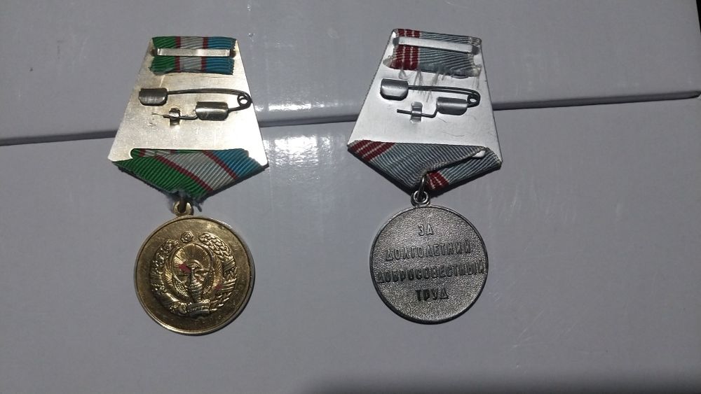 SSSR kumush medali va Shuxrat medali
