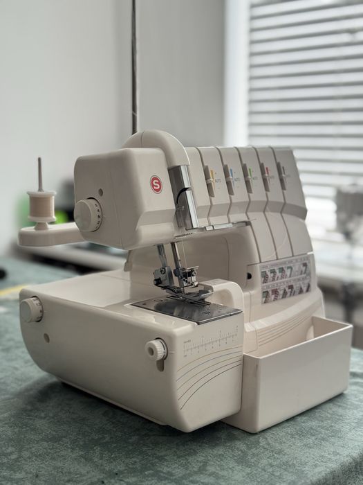Продам коверлок SINGER 14T968DC