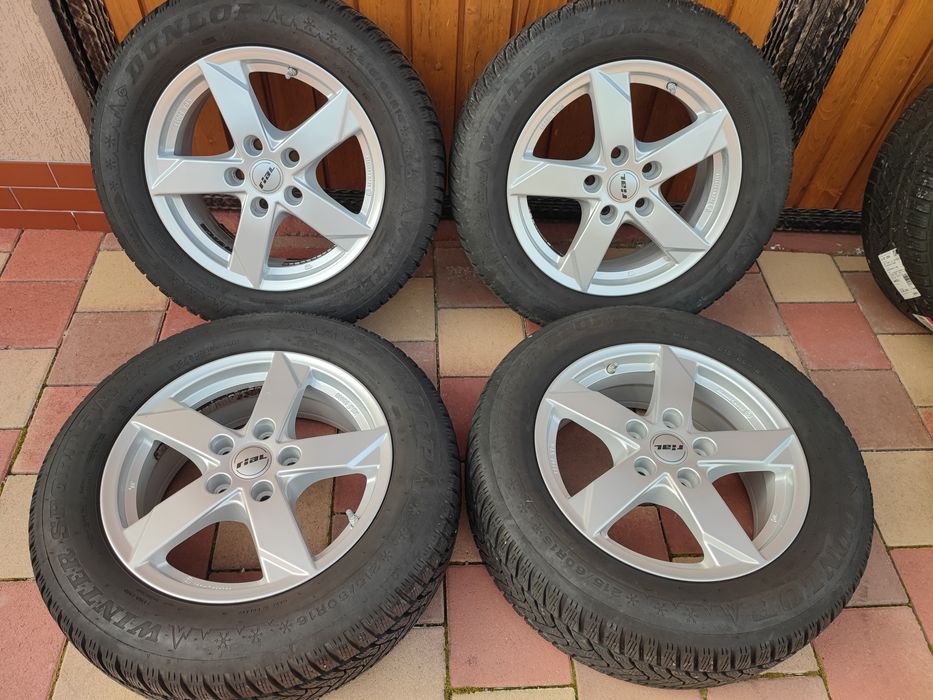 Jante aliaj Opel Astra J 215 60R16 Dunlop iarnă 2018