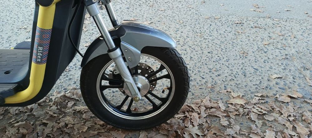Скутер  электронный модель Ridek.