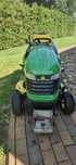 Tractoras de tuns iarbă John Deere
