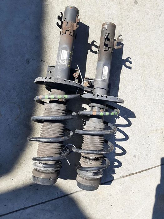 set amortizoare telescoape cu arcuri fata 1.4 tdi seat ibiza 6j 6r0413031f