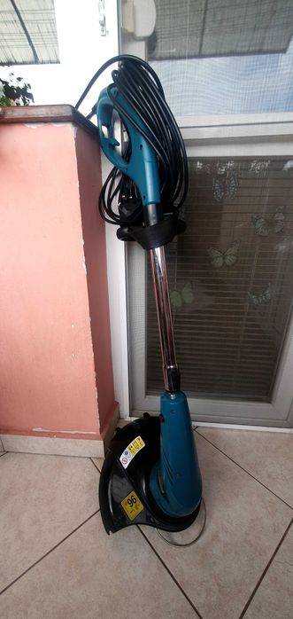 Тример Макита UR3000