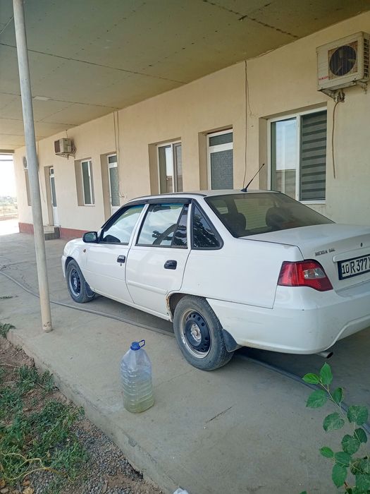 Nexia 2 yili 2010 rangi oq metanda