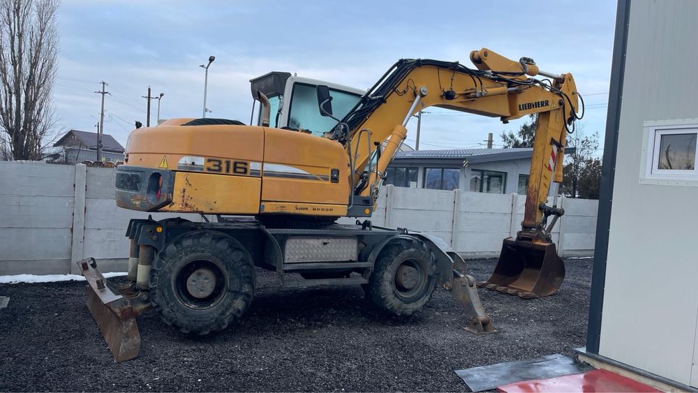 Inchirere Excavator pe pneuri Liebherr A 316