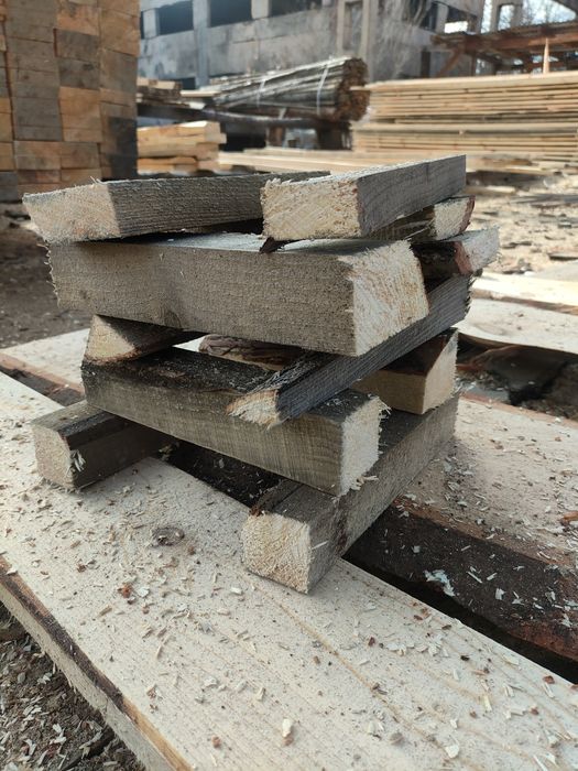 Сухие дрова в мешках