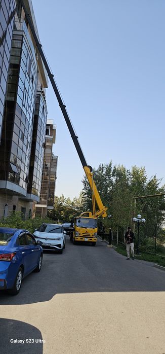 Услуги автовышки кобры по городу Алматы. Автовышка 33 метра.