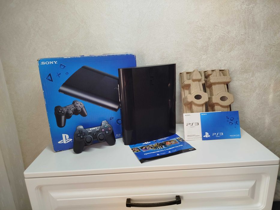 Sony Playstation 3 в коробке с документами