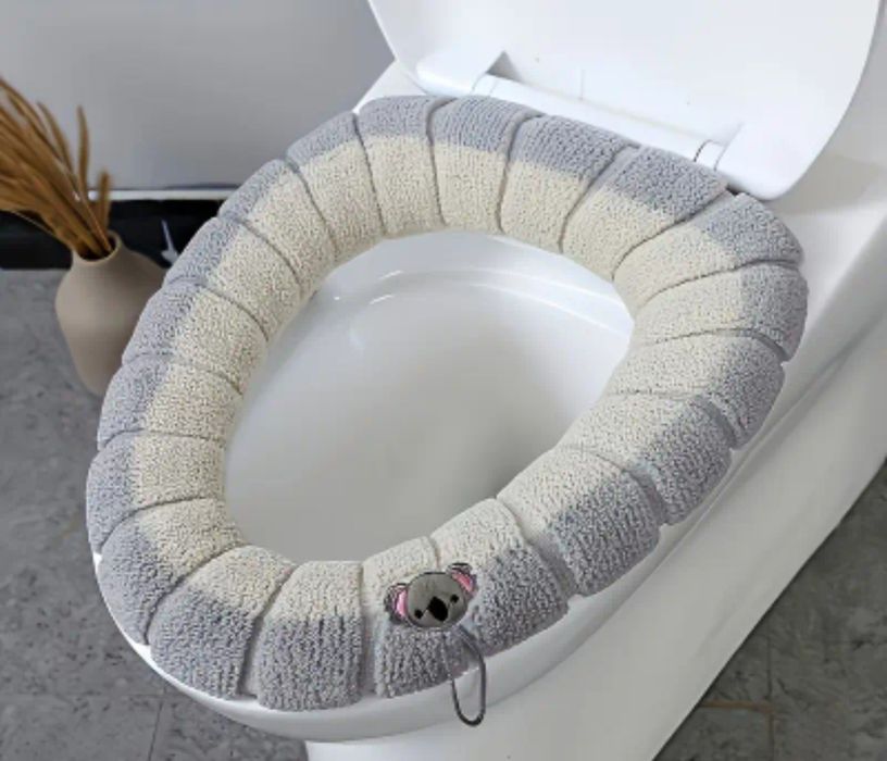 Тёплое сиденье для унитаза.