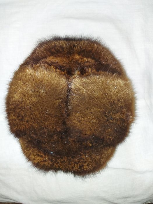 Порлдам   шапку  норкуваю  57  размер