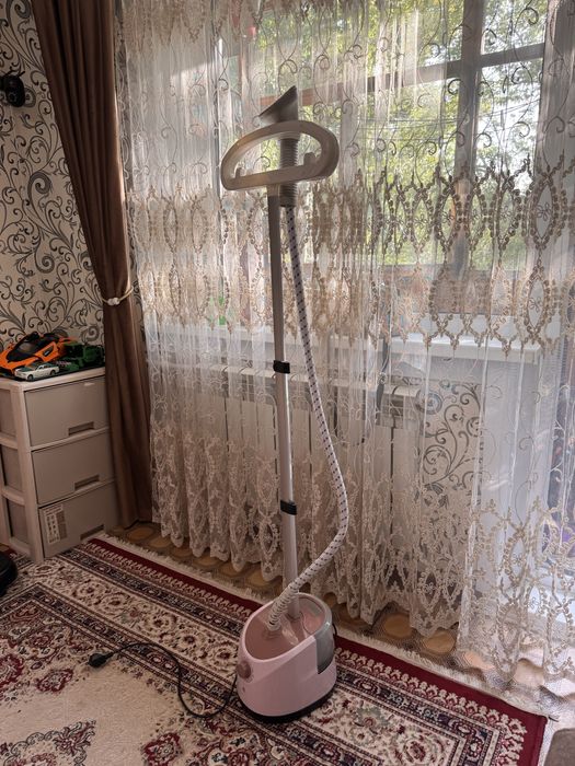 Паровой утюг в хорошем состоянии