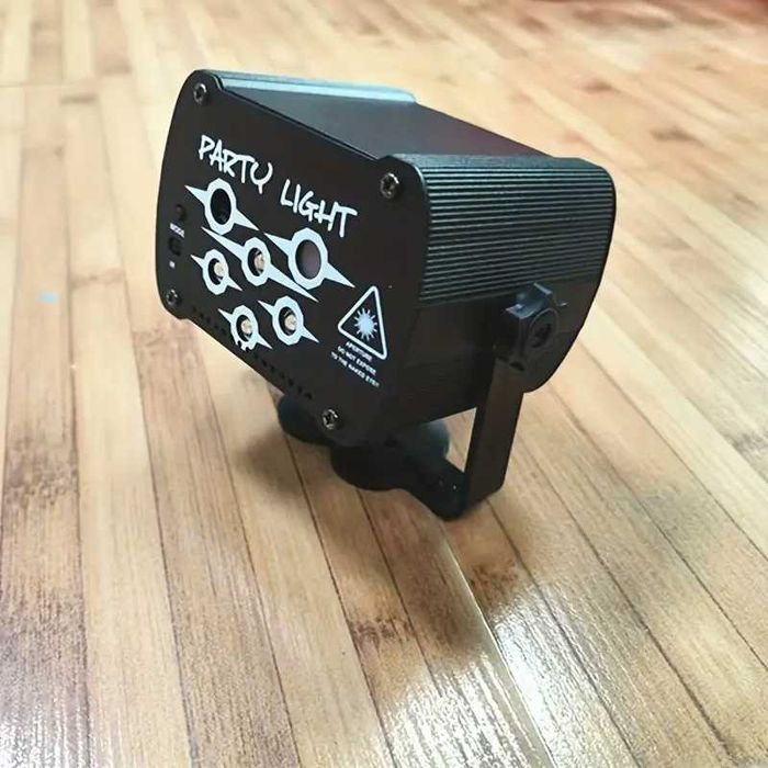 Proiector de lumini laser pentru petreceri etc.Cu telecomandă.