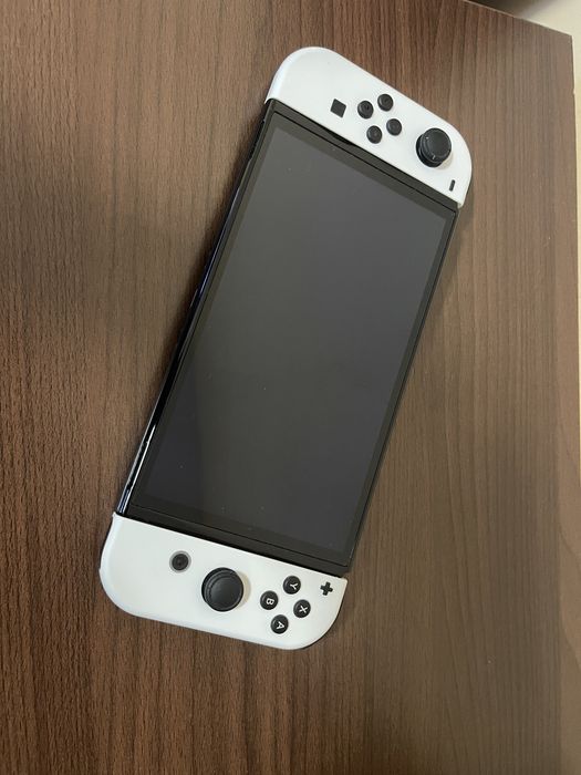 Nintendo Switch OLED alb + 2 jocuri
