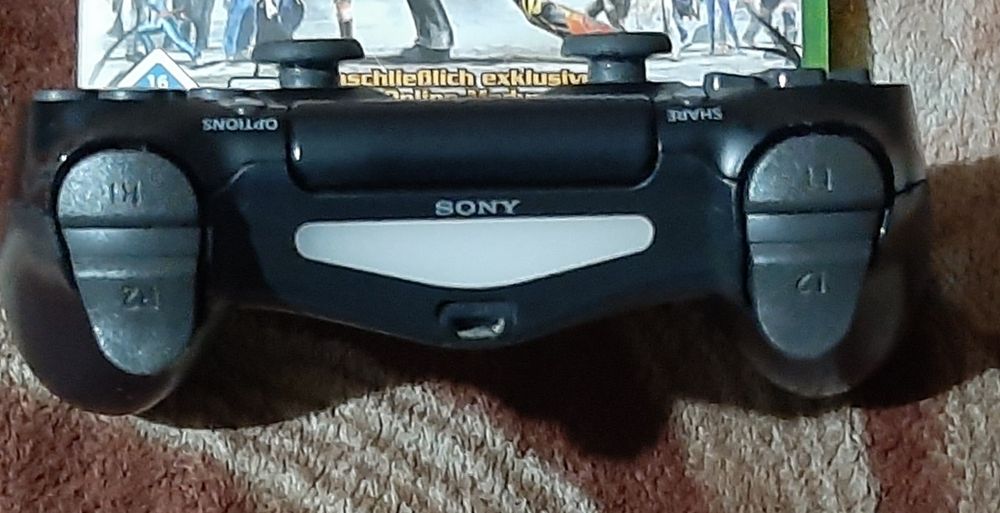 Vând manetă originală PlayStation 4 ps4 în stare bună wireless