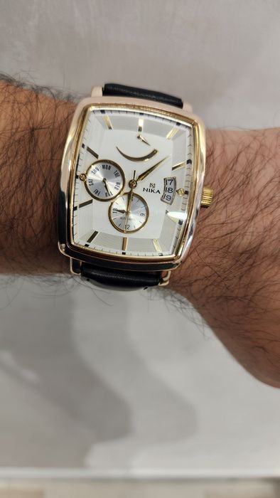 Золотые часы Ника