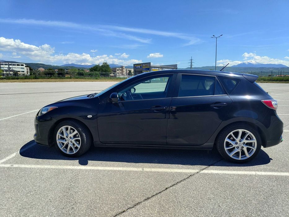 Мазда 3 2.2д 2012г.