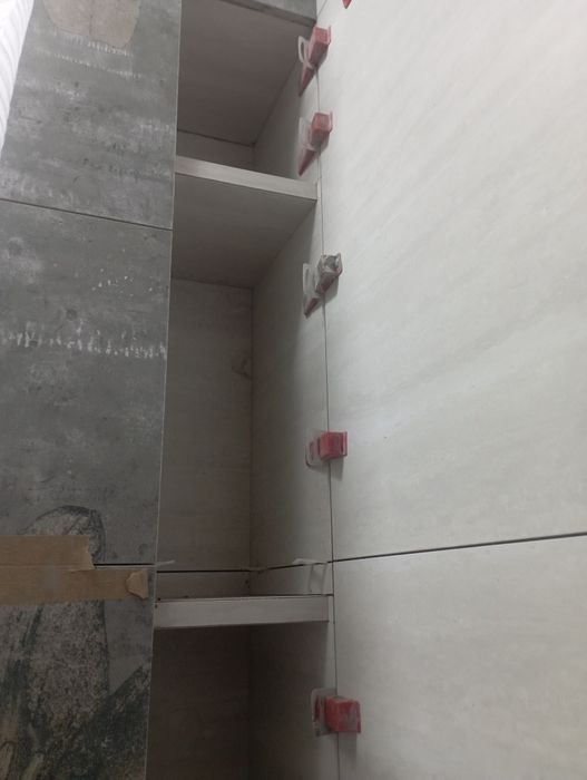 Выполняю работы с кафелем