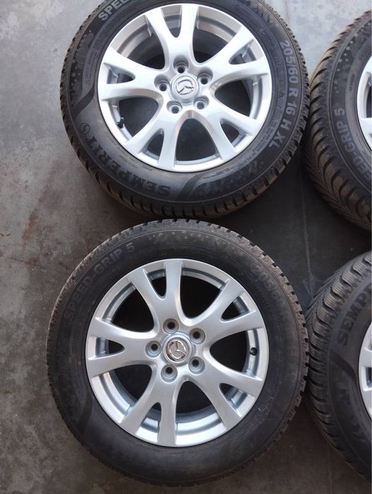 Продавам зимни гуми с лети джанти за всякъкъв модел на мазда