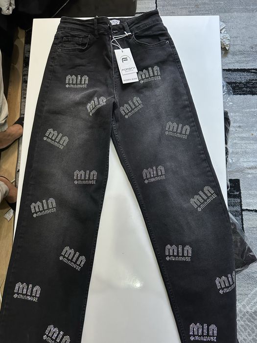 Blugi Miu Miu evazati, disponibil toate marimile