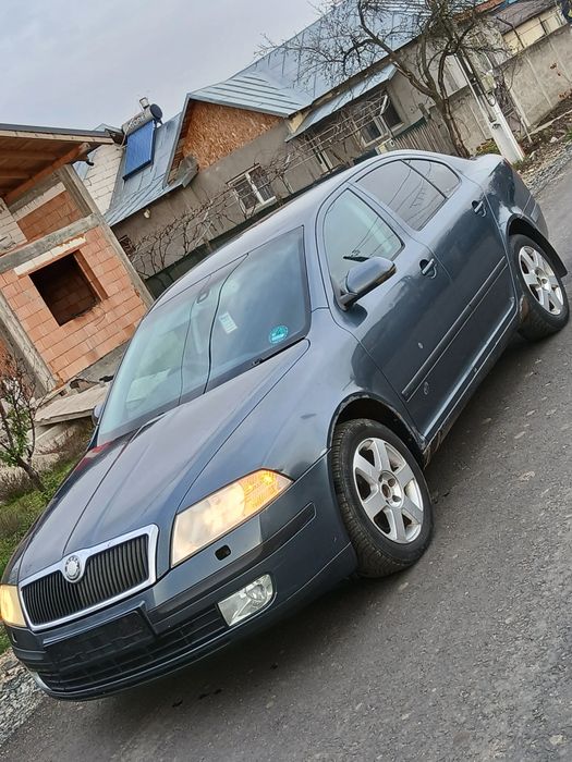 bara aripa use tragar capota grila far stop skoda octavia 2 2007
