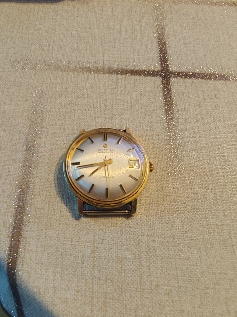 Продавам златен ръчен часовник certina 18к