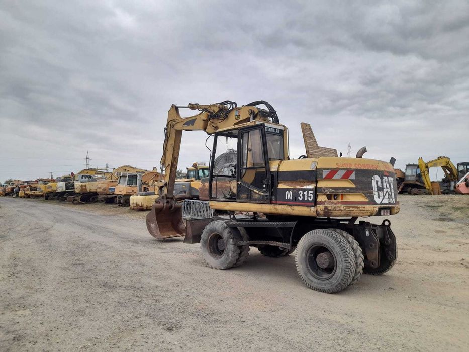 Piese excavator pe roti Caterpillar M 315