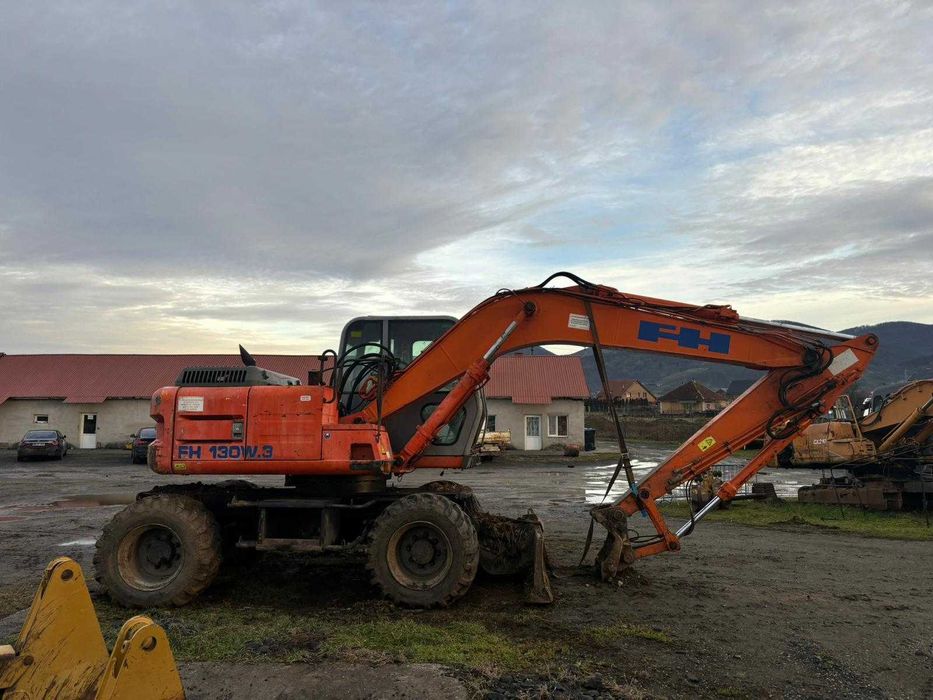 Dezmembrez excavator pe roti Fiat Hitachi FH 130W.3